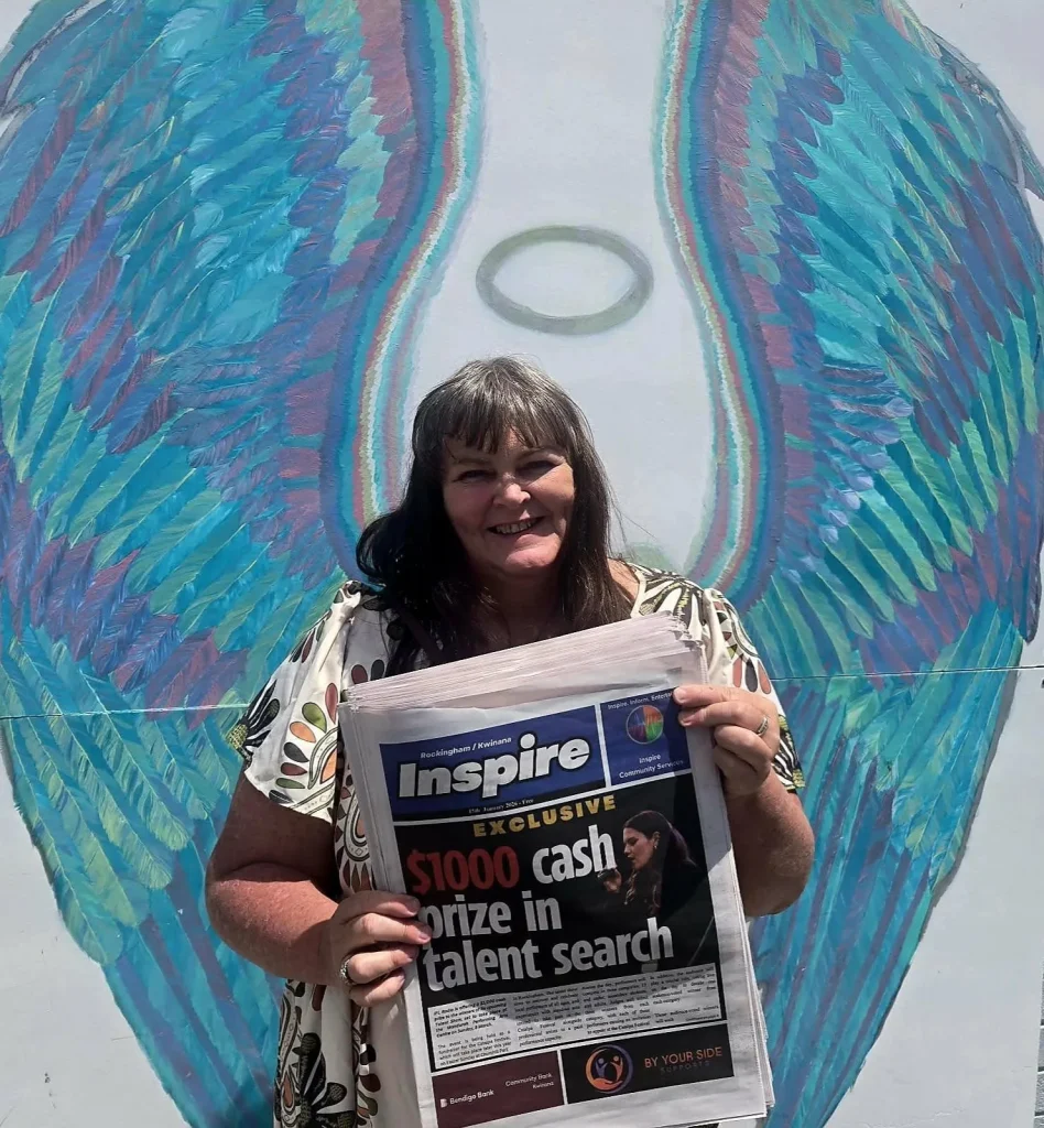 Inspire on the angel wings mural